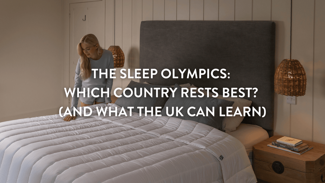 person making a large double bed with a crisp white Putnams duvet a pillow set