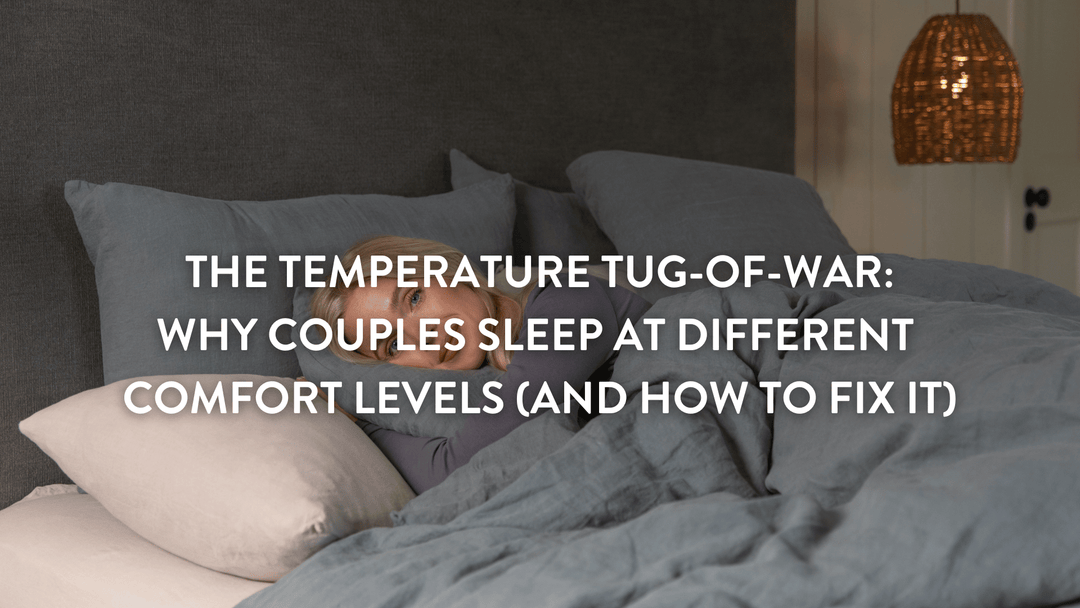 Person lying in bed on a putnams pillow under a grey duvet