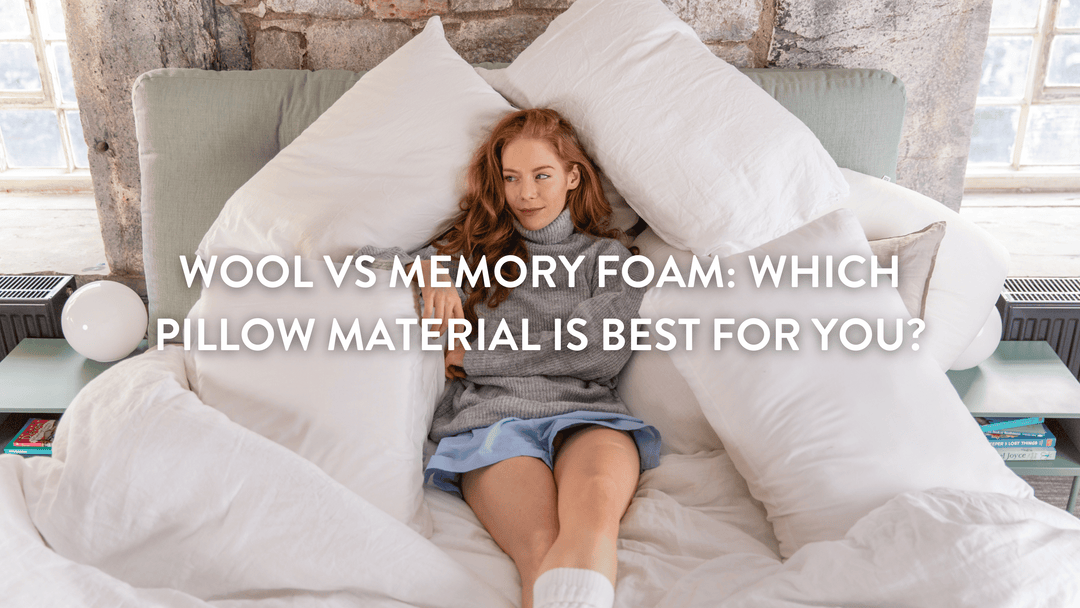 Person sitting on a bed surrounded by memory foam pillows and wool pillows  