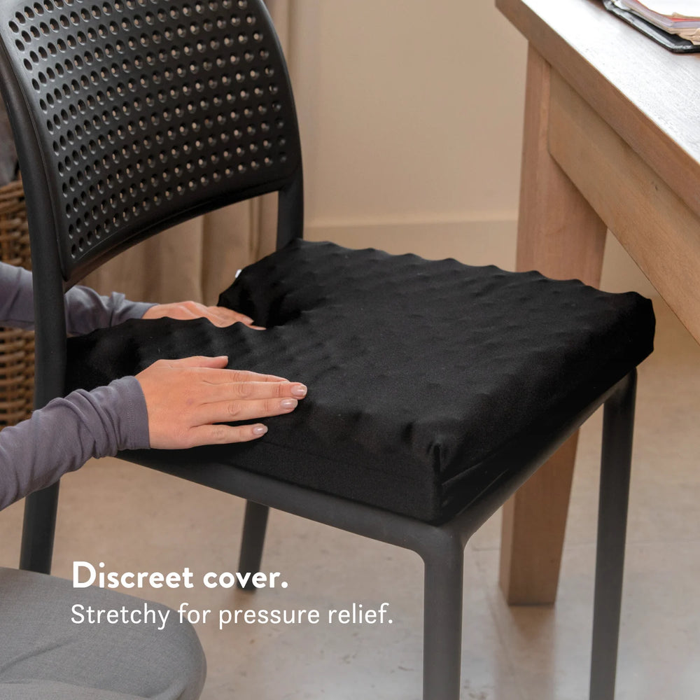 Sero Pressure Cushion Coccyx Cut Out - For tailbone pain and coccydynia. Discreet stretch cover available in different sizes and thicknesses. Handmade in the UK. 2 year guarantee.